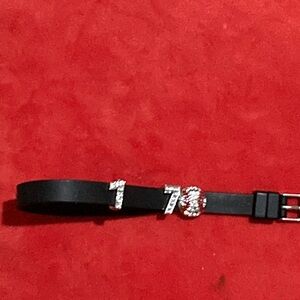 Black wrist bracelet with clear stones charms